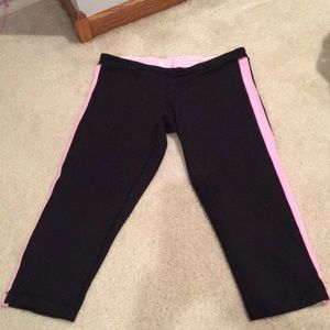 Size 8 Lululemon black and pink crop leggings
